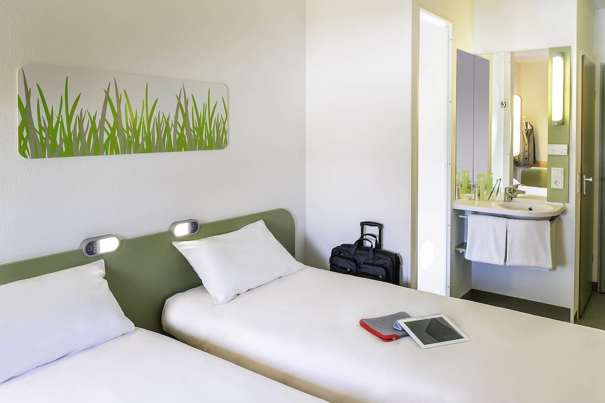 twin room, 2 single beds | desk, laptop workspace, blackout curtains, soundproofing