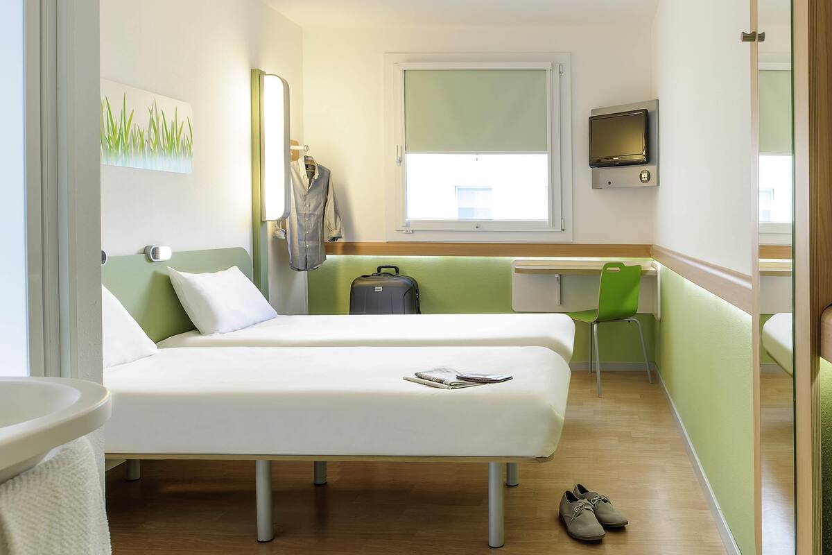 twin room, 2 single beds | desk, laptop workspace, blackout curtains, soundproofing