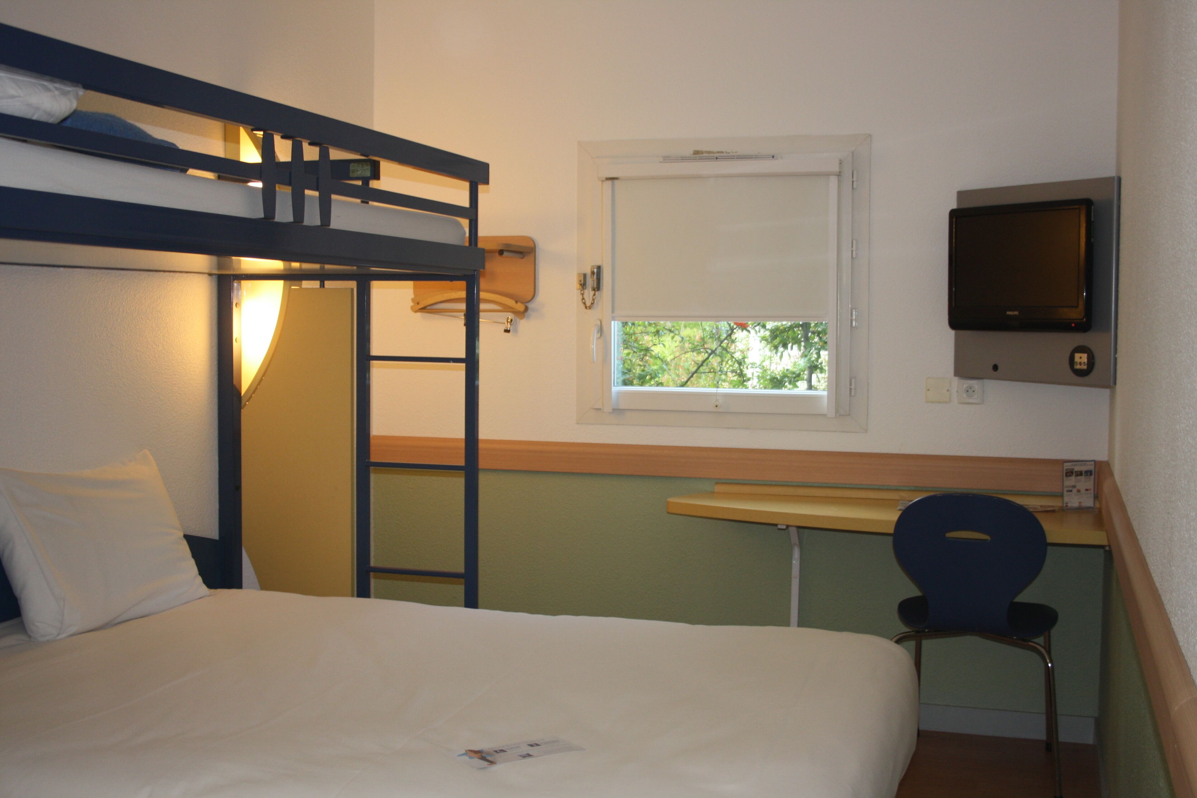 triple room, multiple beds | view from room