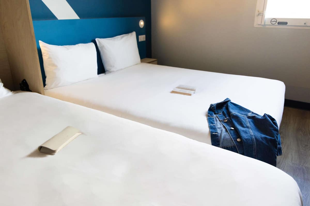 Triple Room, Multiple Beds | Hypo-allergenic bedding, desk, blackout curtains, soundproofing