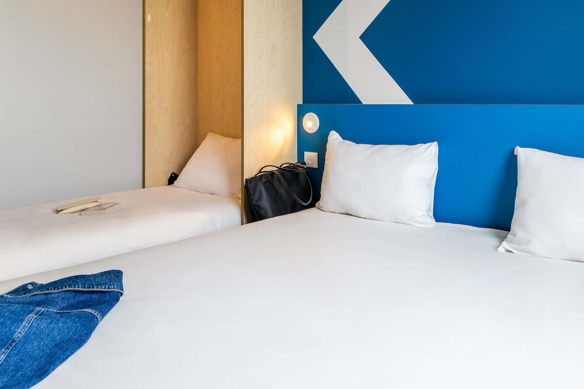 Triple Room, Multiple Beds | Hypo-allergenic bedding, desk, blackout drapes, soundproofing