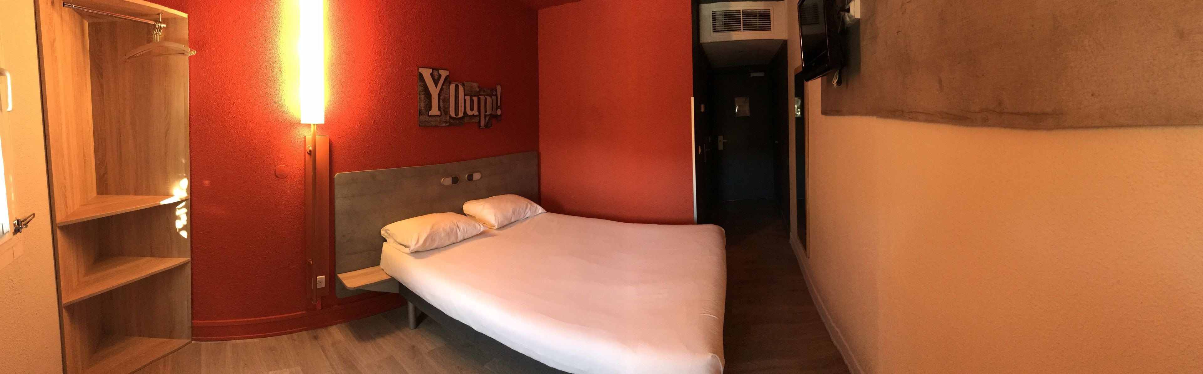 individually decorated, desk, laptop workspace, blackout curtains