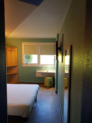Individually decorated, desk, laptop workspace, blackout drapes