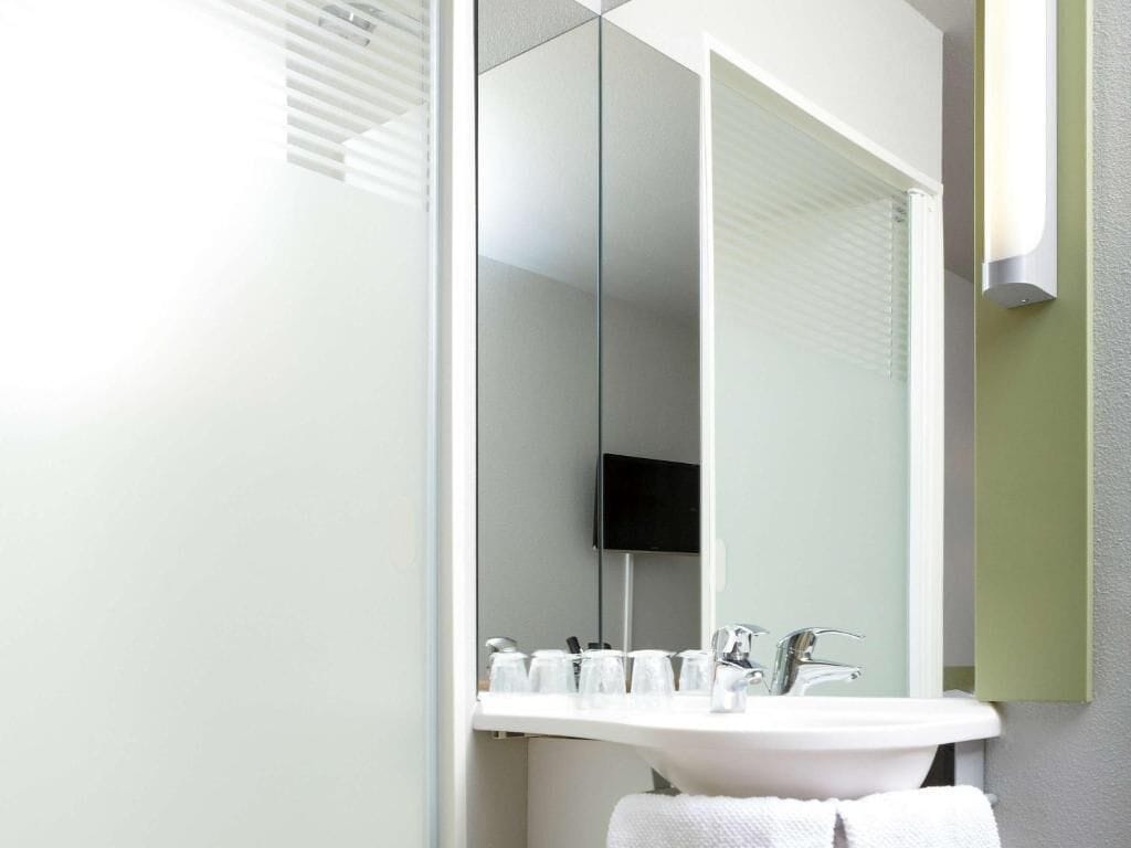 shower, eco-friendly toiletries, hair dryer, towels