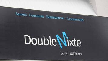 A building with a sign that reads 'DoubleNixte' and 'Le lieu différence.'