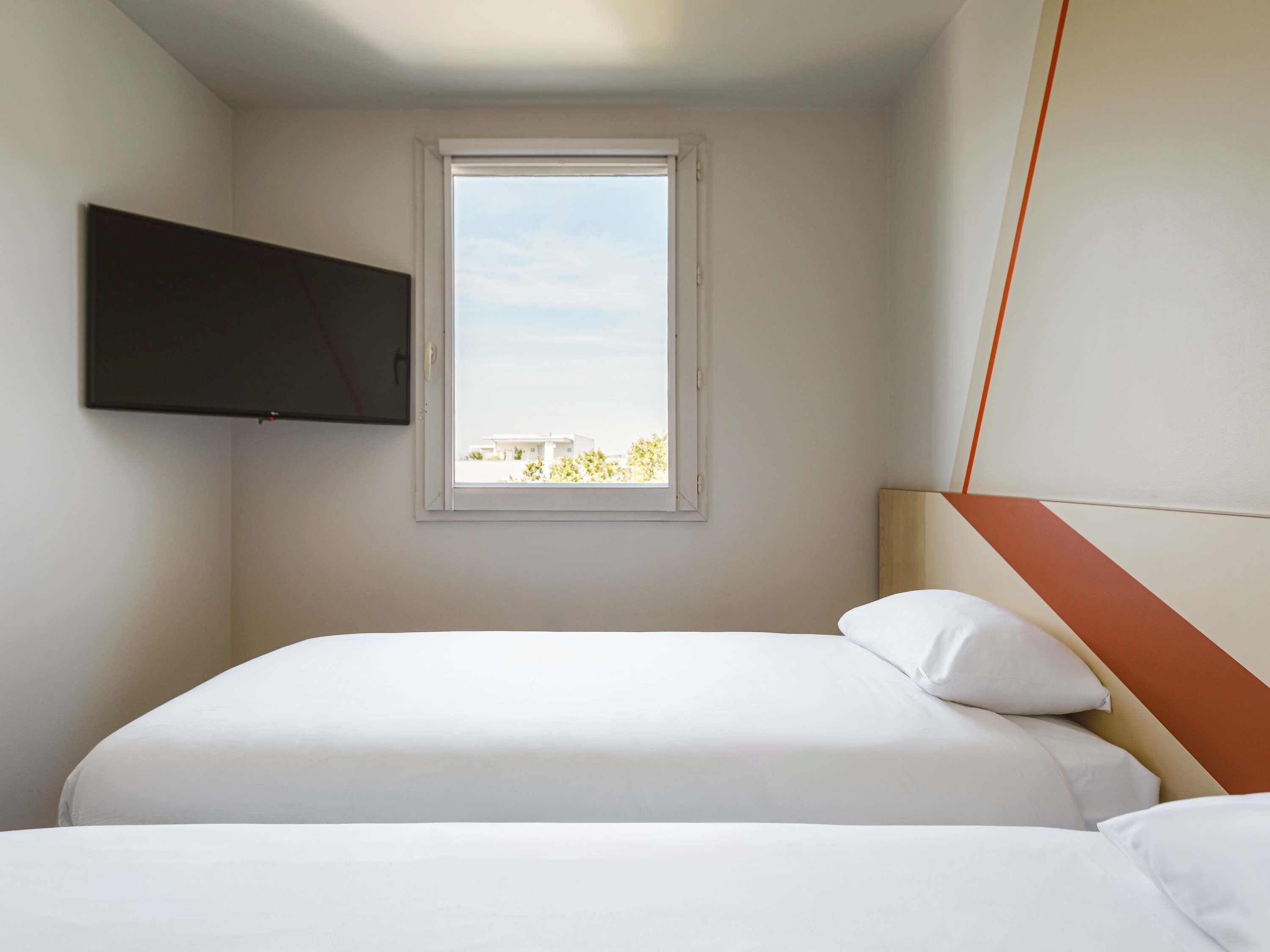 Tomannsrom, 2 enkeltsenger | Skrivebord, lydisolert, barnesenger (inkludert) og wi-fi (inkludert)