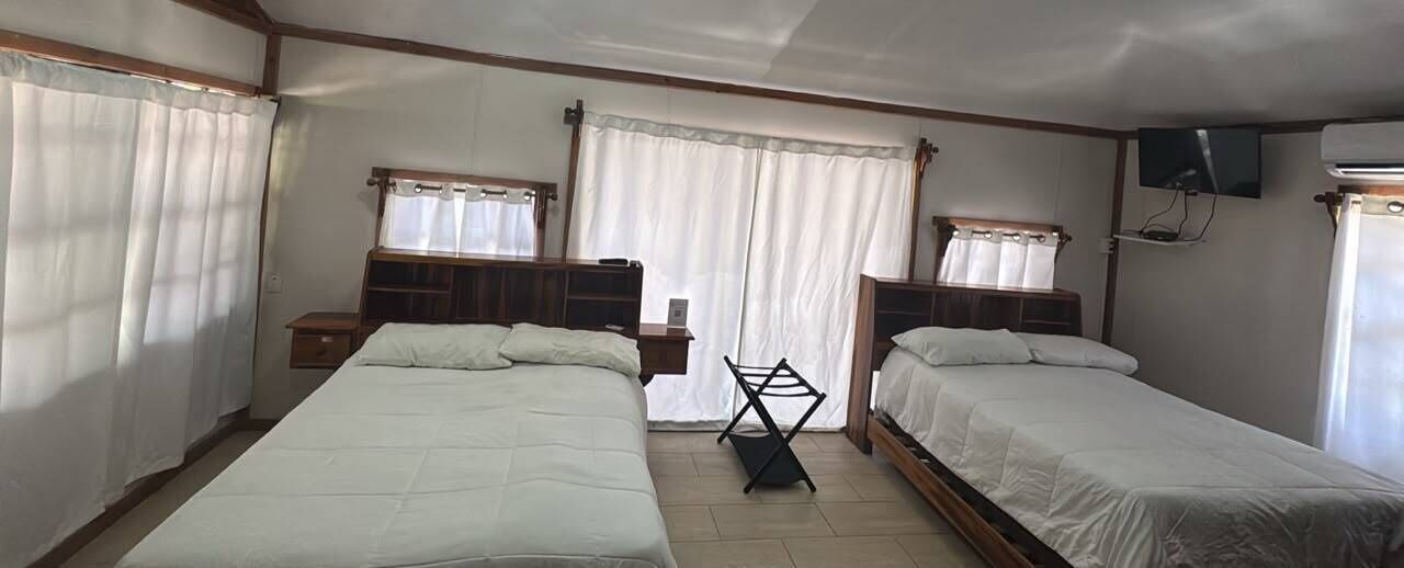 Garden View, Two Double Beds (WB2) | WiFi (free), bed sheets