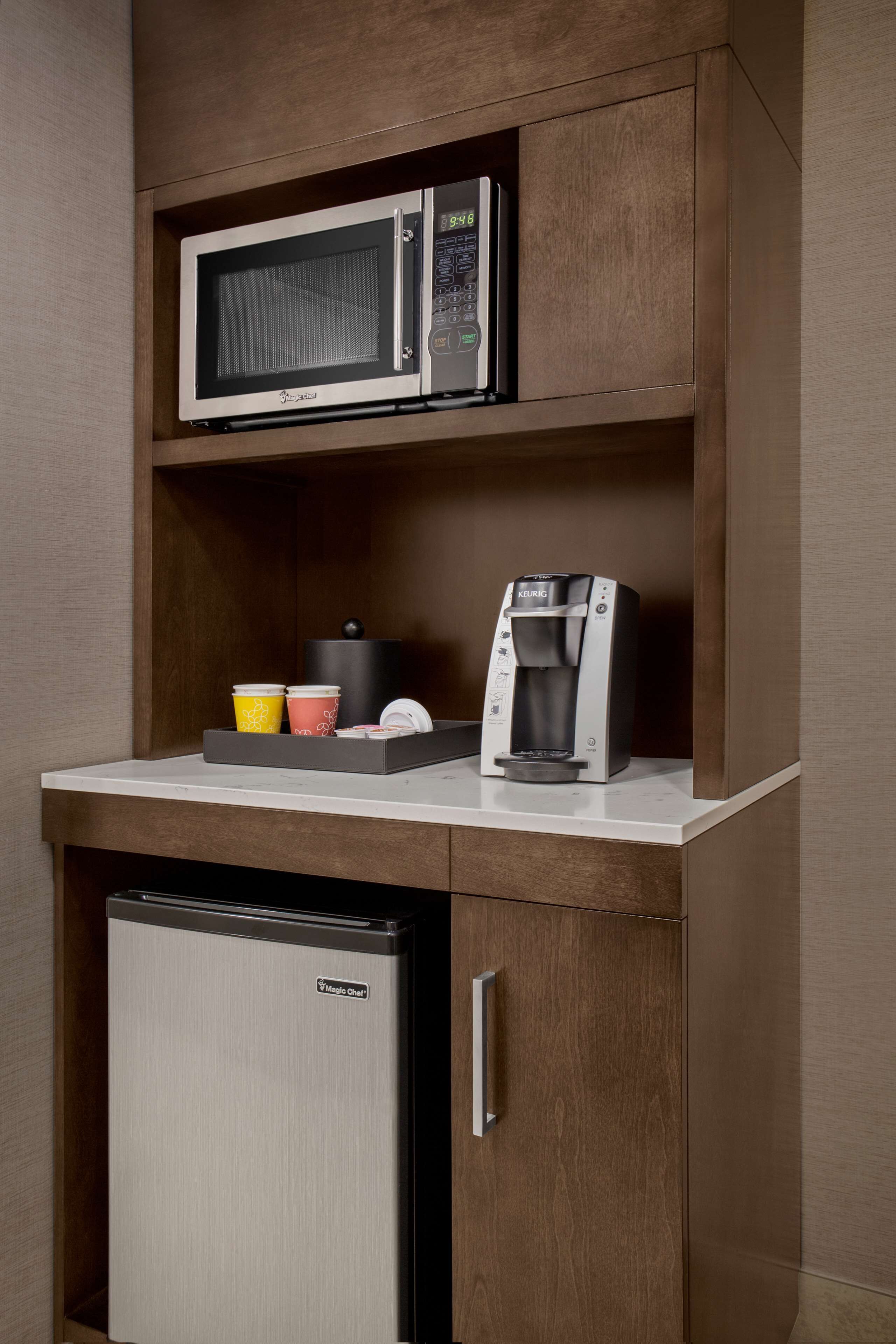 premium bedding, pillow-top beds, desk, laptop workspace