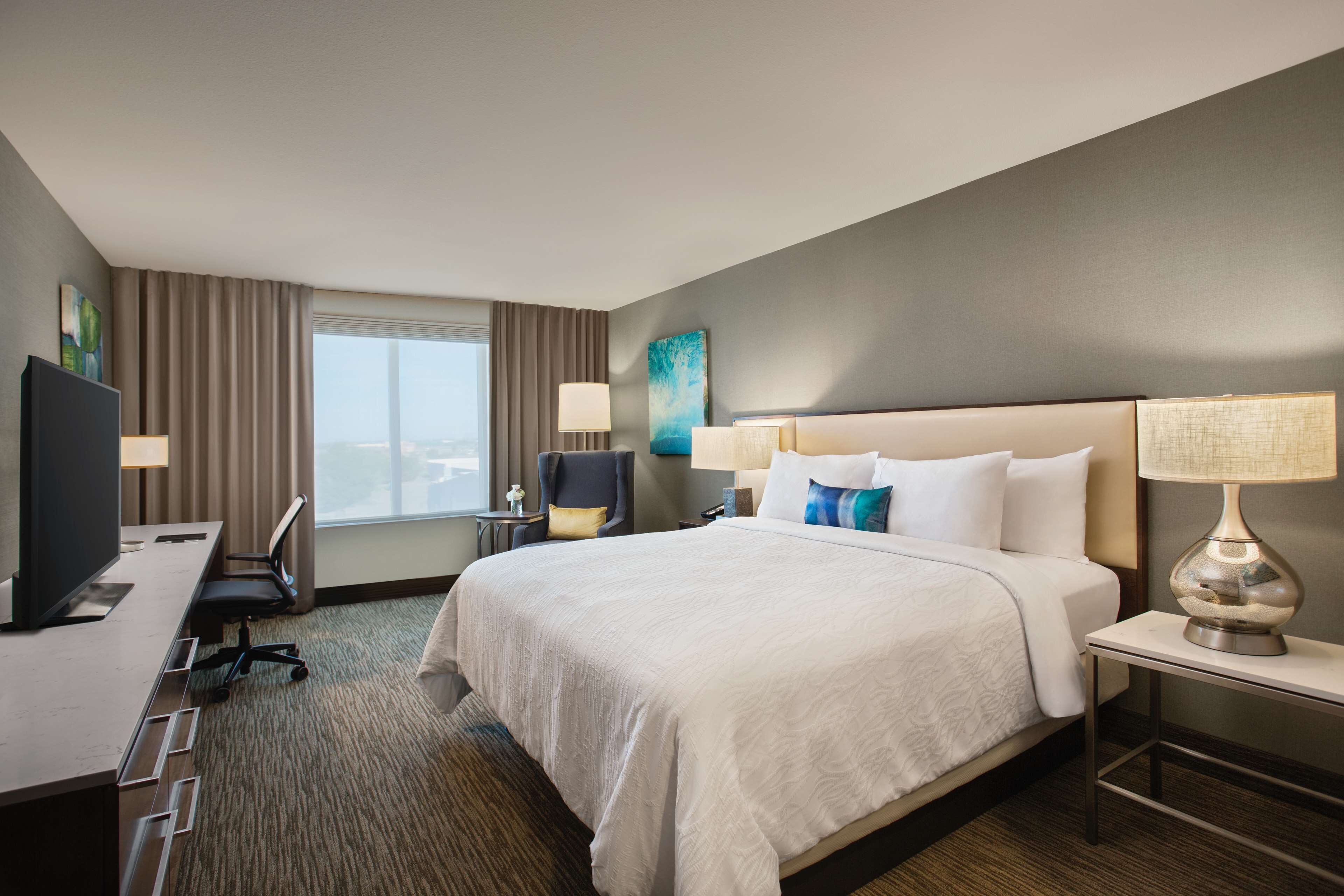 Premium bedding, pillowtop beds, desk, laptop workspace