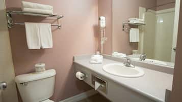 Combined shower/bathtub, hair dryer, towels, soap