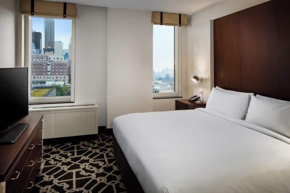 Premium bedding, down comforters, in-room safe, desk
