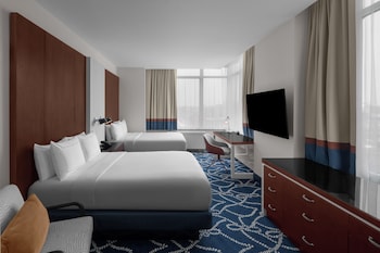 Premium bedding, down comforters, in-room safe, desk at Hilton Brooklyn New York