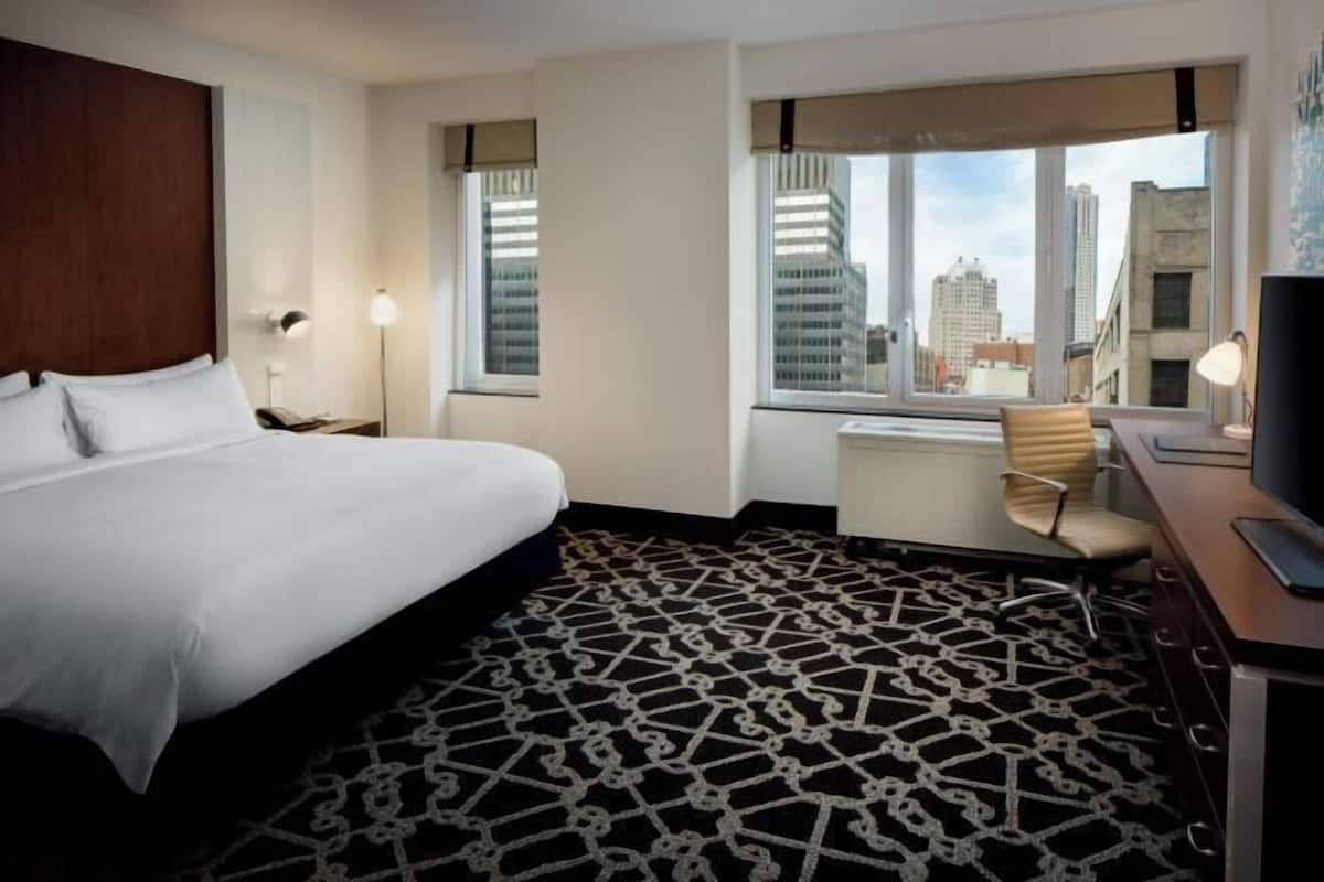 Premium bedding, down comforters, in-room safe, desk
