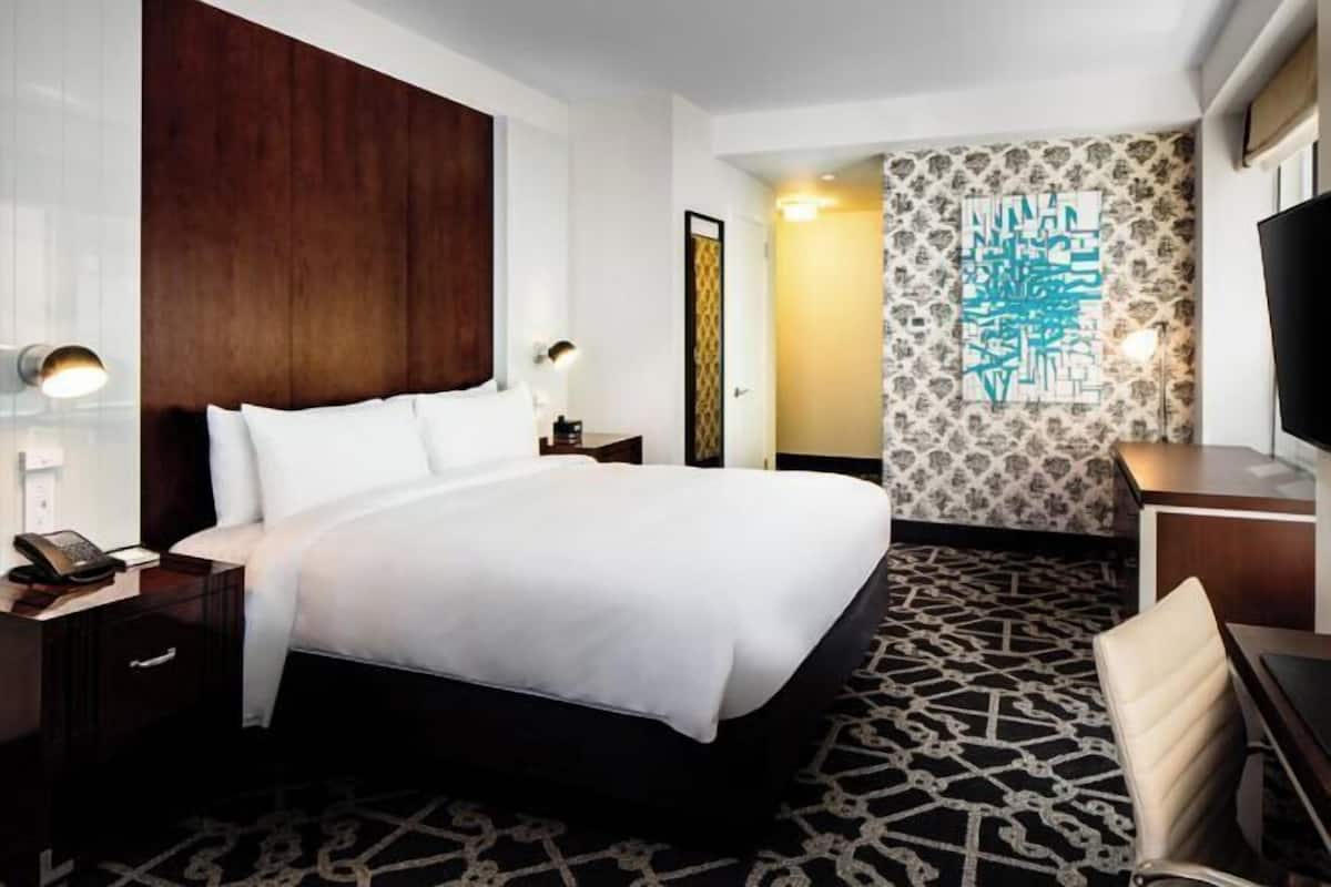 Premium bedding, down comforters, in-room safe, desk