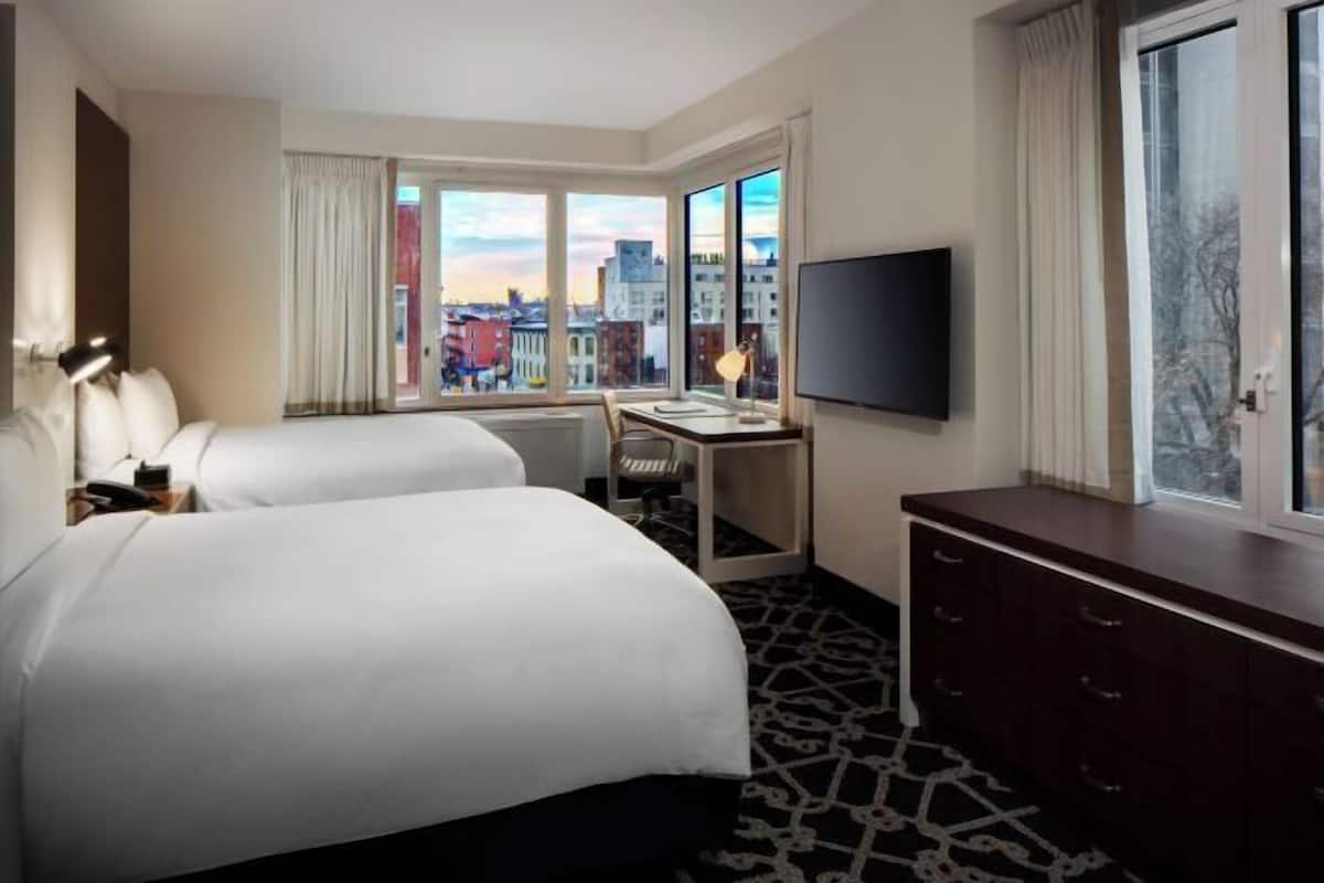 Premium bedding, down comforters, in-room safe, desk