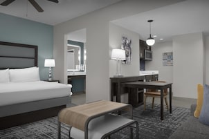 Caja fuerte, cortinas opacas, tabla de planchar con plancha