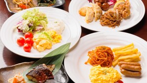 A variety of dishes on a table, including vegetables, meat, and seafood. - J Hotel Rinku (Tokoname)