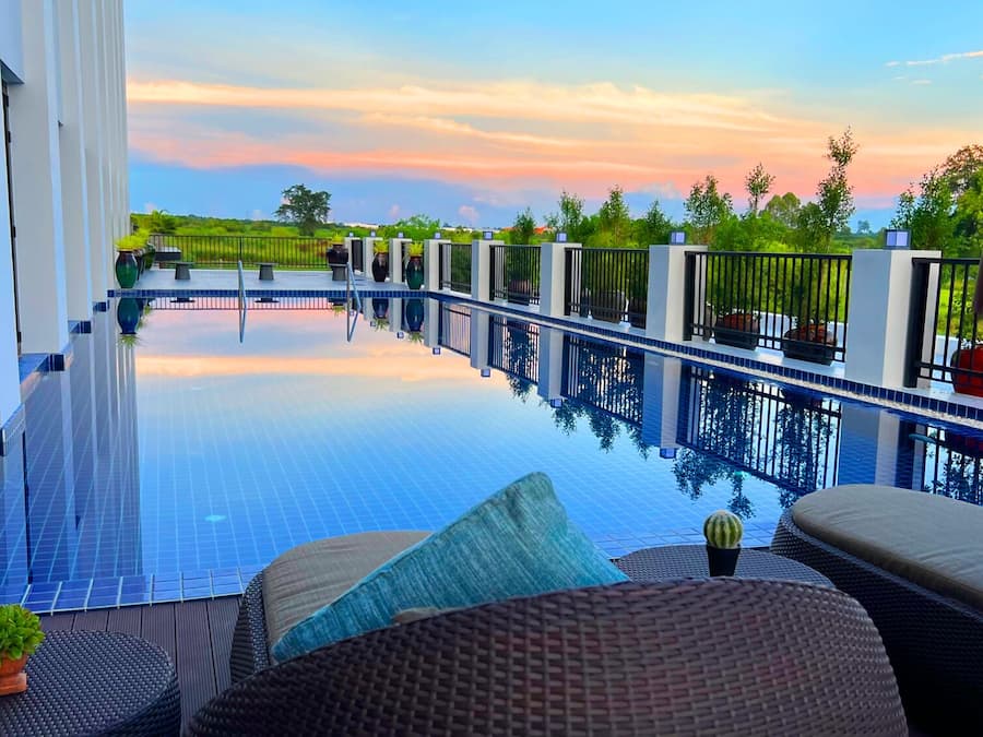 Outdoor pool, open 6:00 AM to 9:00 PM, sun loungers
