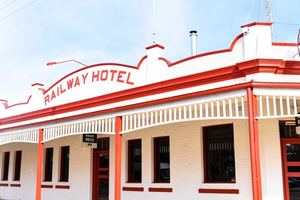 A building with a sign reading "Railway Hotel Bar".