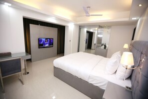 Premium bedding, down comforters, minibar, in-room safe