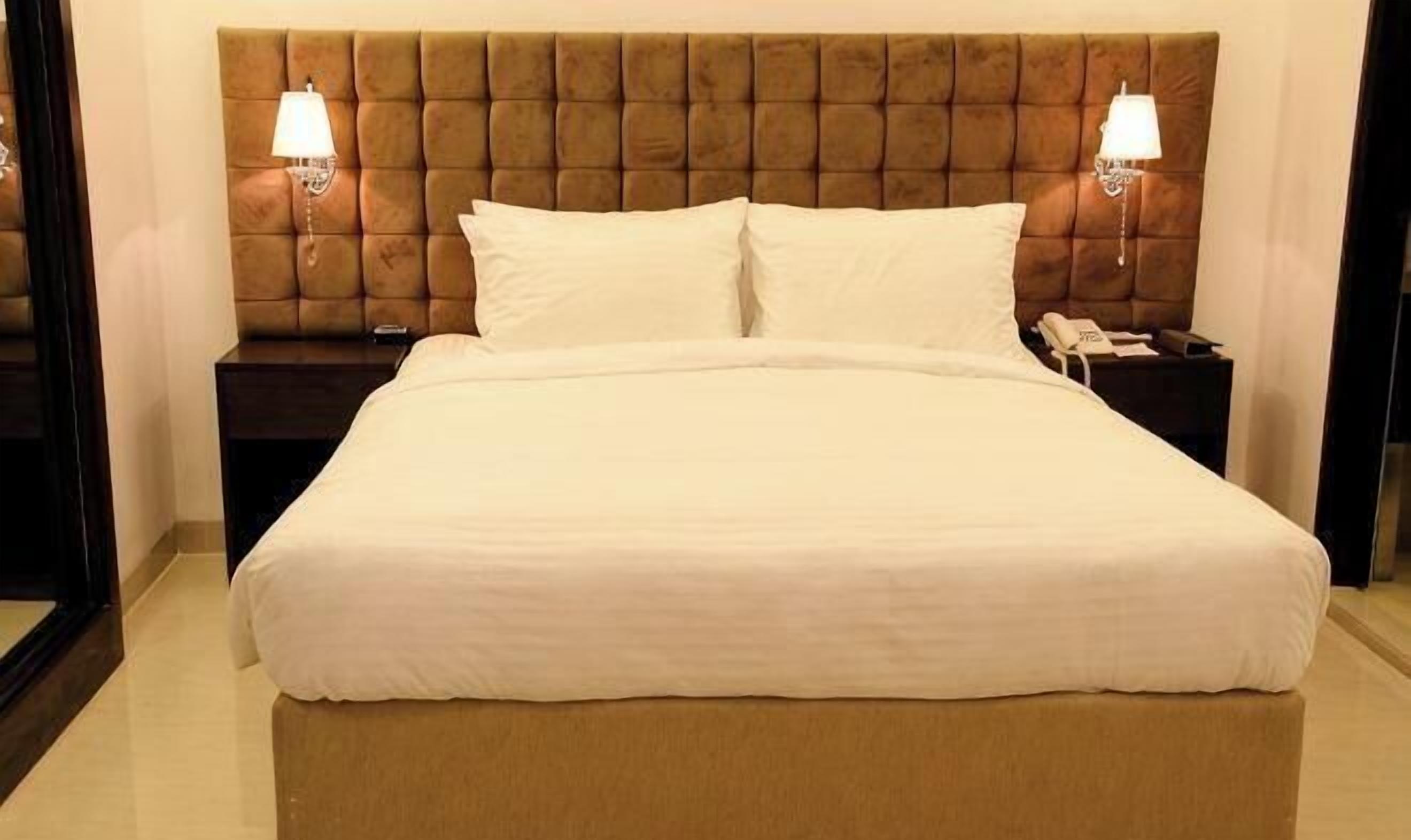 Premium bedding, down duvets, minibar, in-room safe