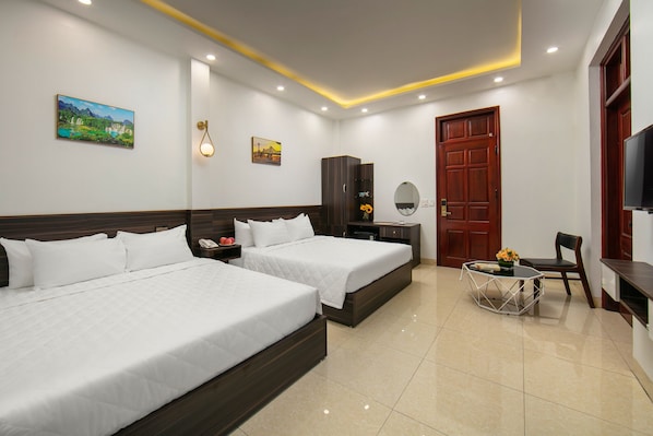 Exclusive Quadruple Room | 1 bedroom, premium bedding, down comforters, memory foam beds - New Airport Hotel (Hanoi)
