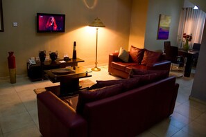 Deluxe Room | Living area | LCD TV