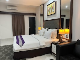 Suíte, vista para o jardim | Escrivaninha, Wi-Fi de cortesia, roupa de cama