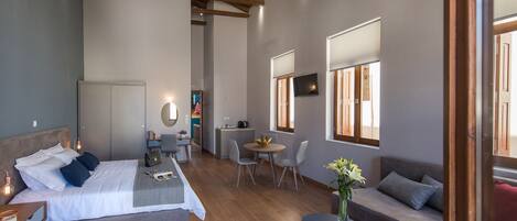 Deluxe Quadruple Room, Multiple Beds | Premium bedding, free minibar, in-room safe, desk