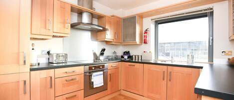 Design Apartment, 2 Bedrooms, 2 Bathrooms | Private kitchen | Fridge, microwave, oven, stovetop