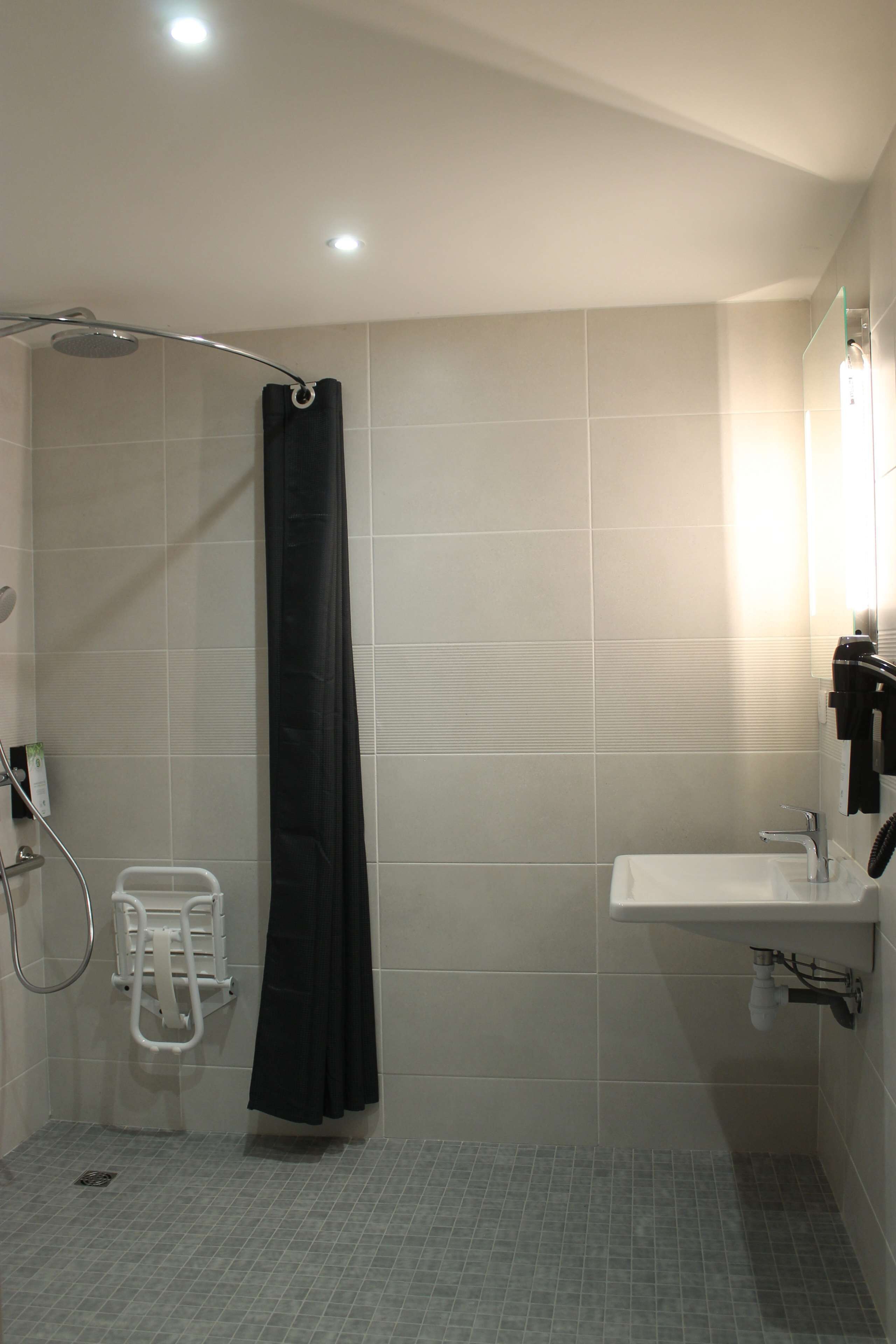 family room, multiple beds | bathroom | shower, eco-friendly toiletries, hair dryer, towels
