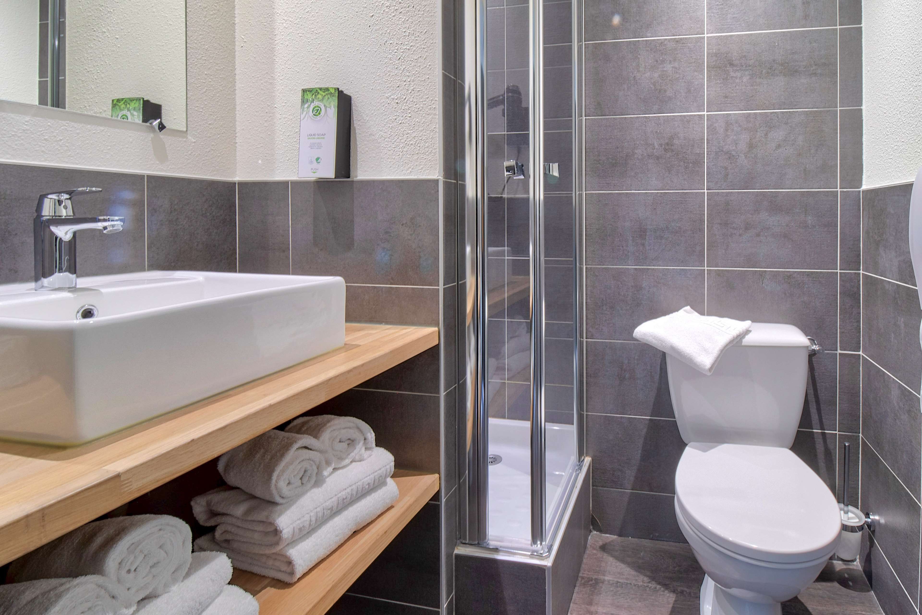 shower, eco-friendly toiletries, hair dryer, towels