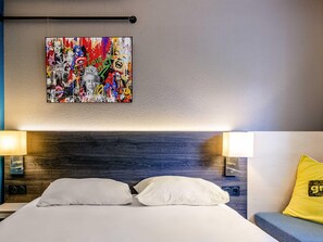 Pillow-top beds, desk, soundproofing, free WiFi