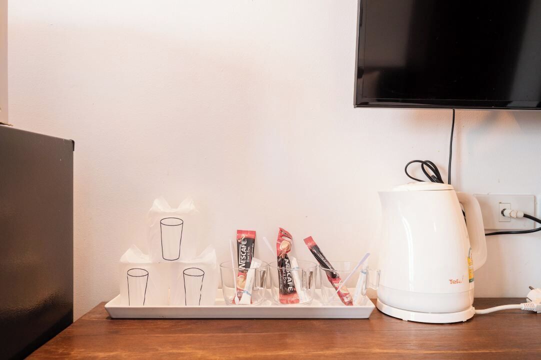 deluxe room, 1 king bed with sofa bed, kitchenette, city view | room amenity