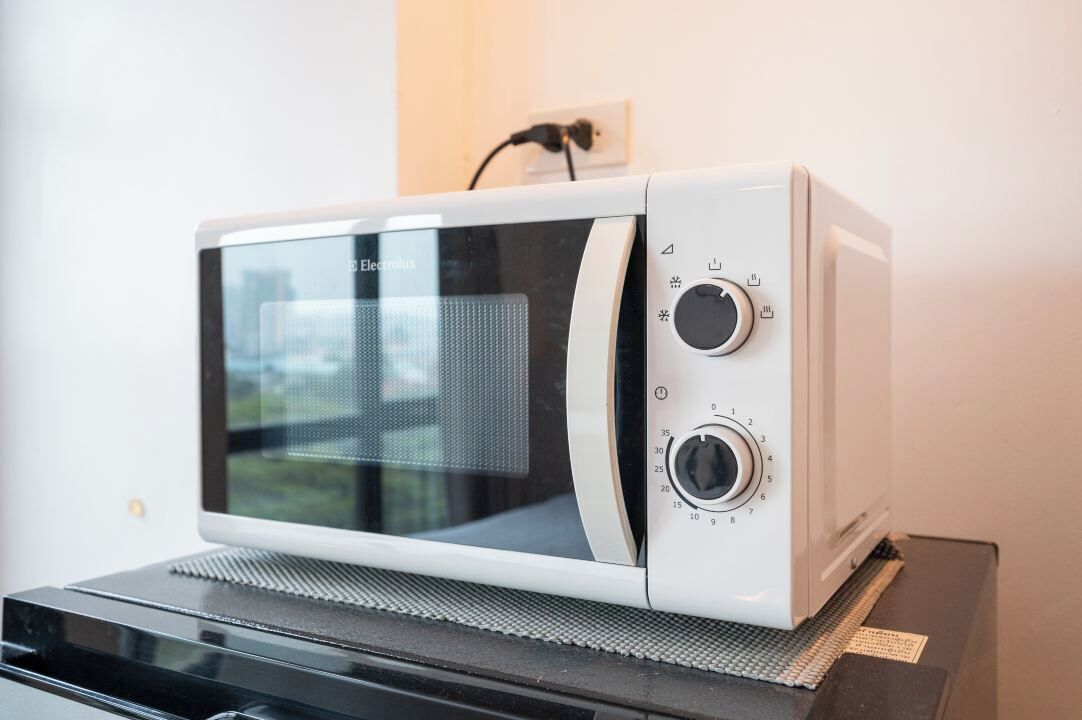 family room, refrigerator & microwave, city view | microwave