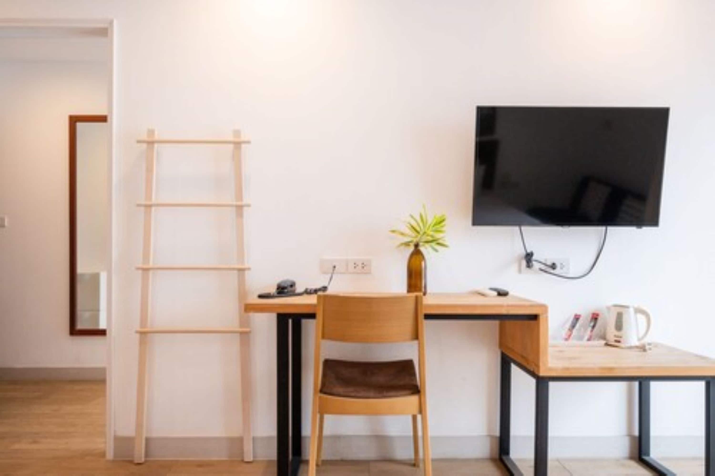 superior room, 1 king bed, refrigerator & microwave, city view | in-room safe, desk, free wifi, bed sheets