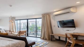 Deluxe Room, 1 King Bed with Sofa bed, Kitchenette, City View | In-room safe, desk, free WiFi, bed sheets