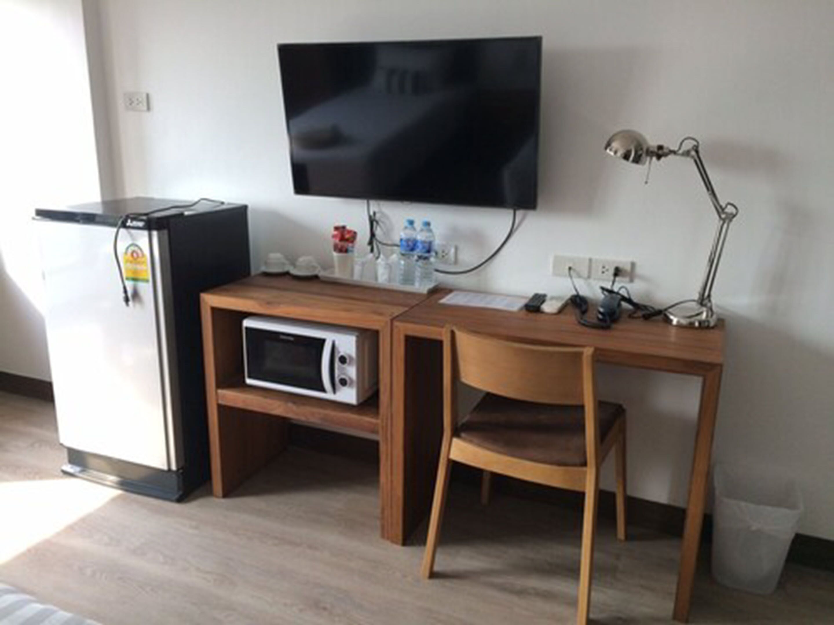 superior room, 2 single beds, refrigerator & microwave, garden view | room amenity