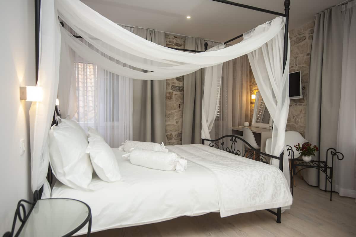 Premium bedding, down duvets, in-room safe, desk