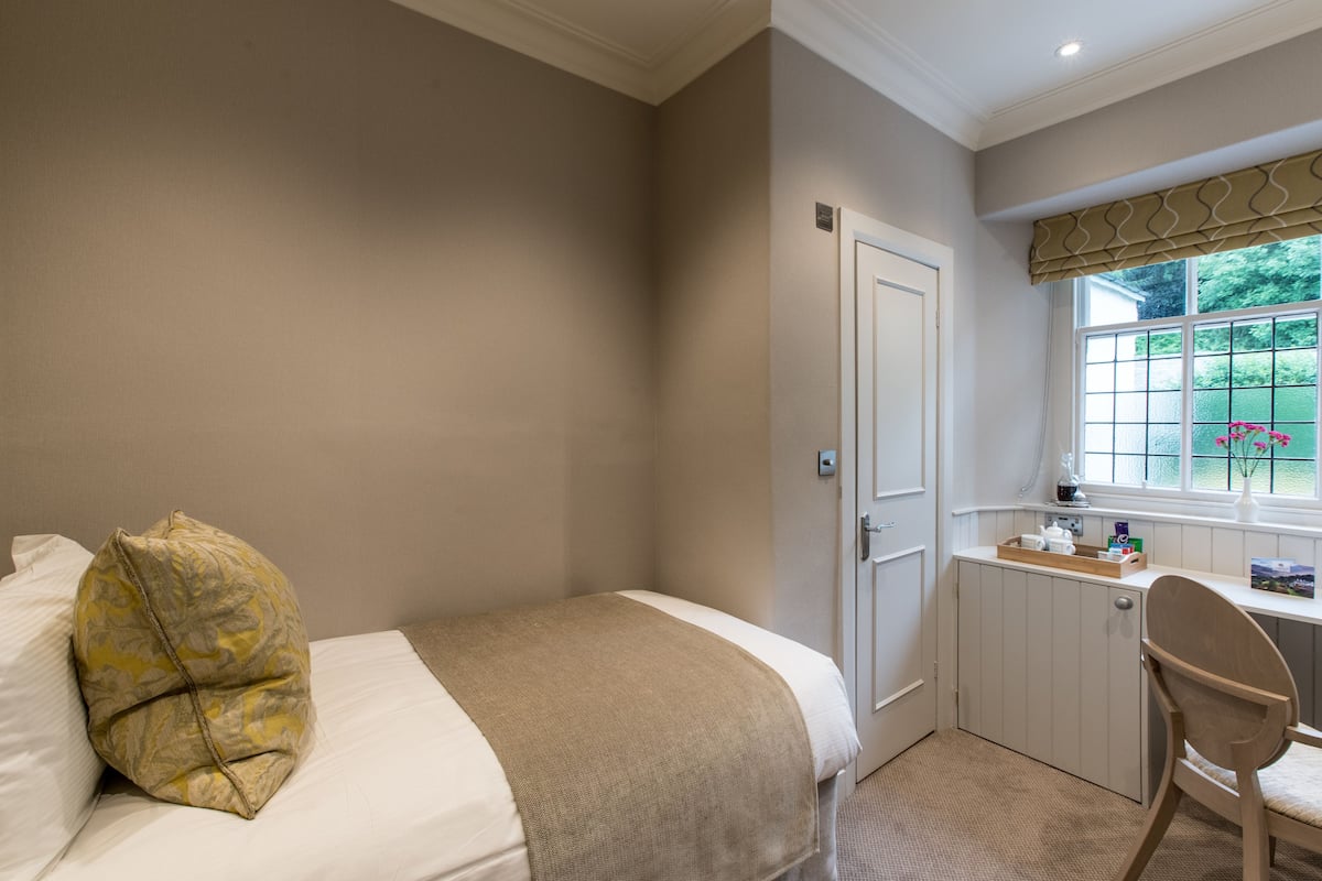 Premium bedding, blackout curtains, iron/ironing board, free WiFi