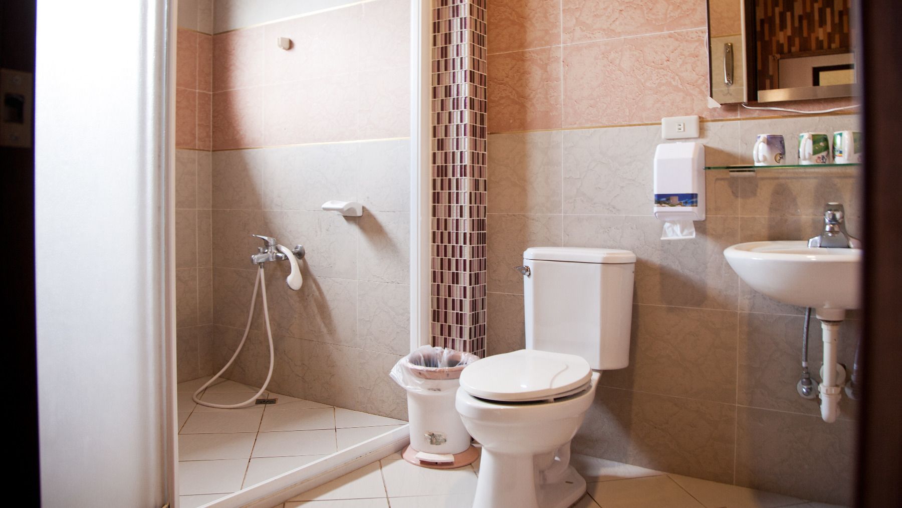 standard quadruple room | bathroom | shower, free toiletries, hair dryer, slippers