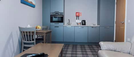 Apartment, 2 Bedrooms | Living area | TV