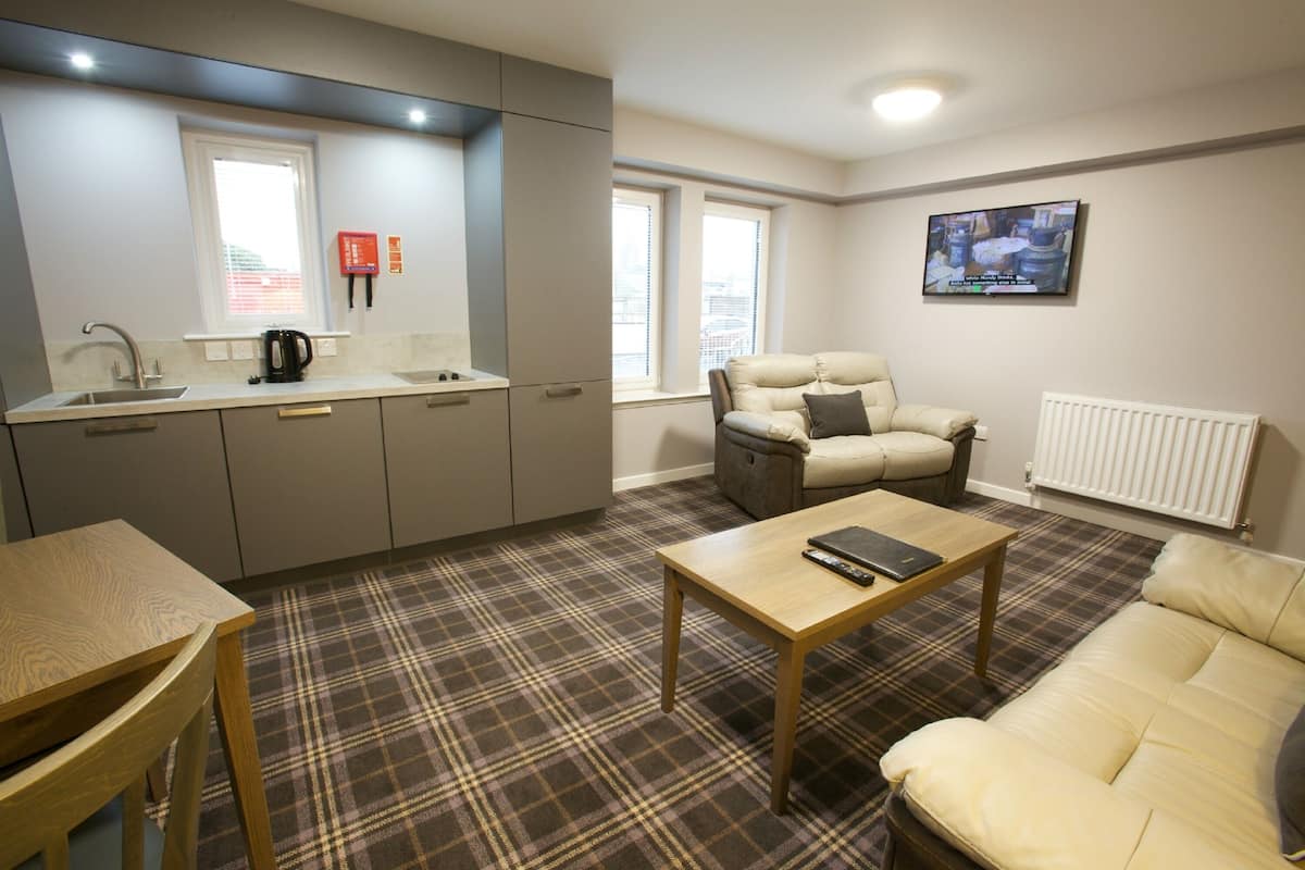 one bedroom apartment | living room | tv