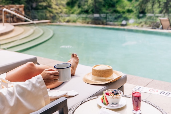 Outdoor pool, open 7:00 AM to 11:00 PM, pool umbrellas, pool loungers