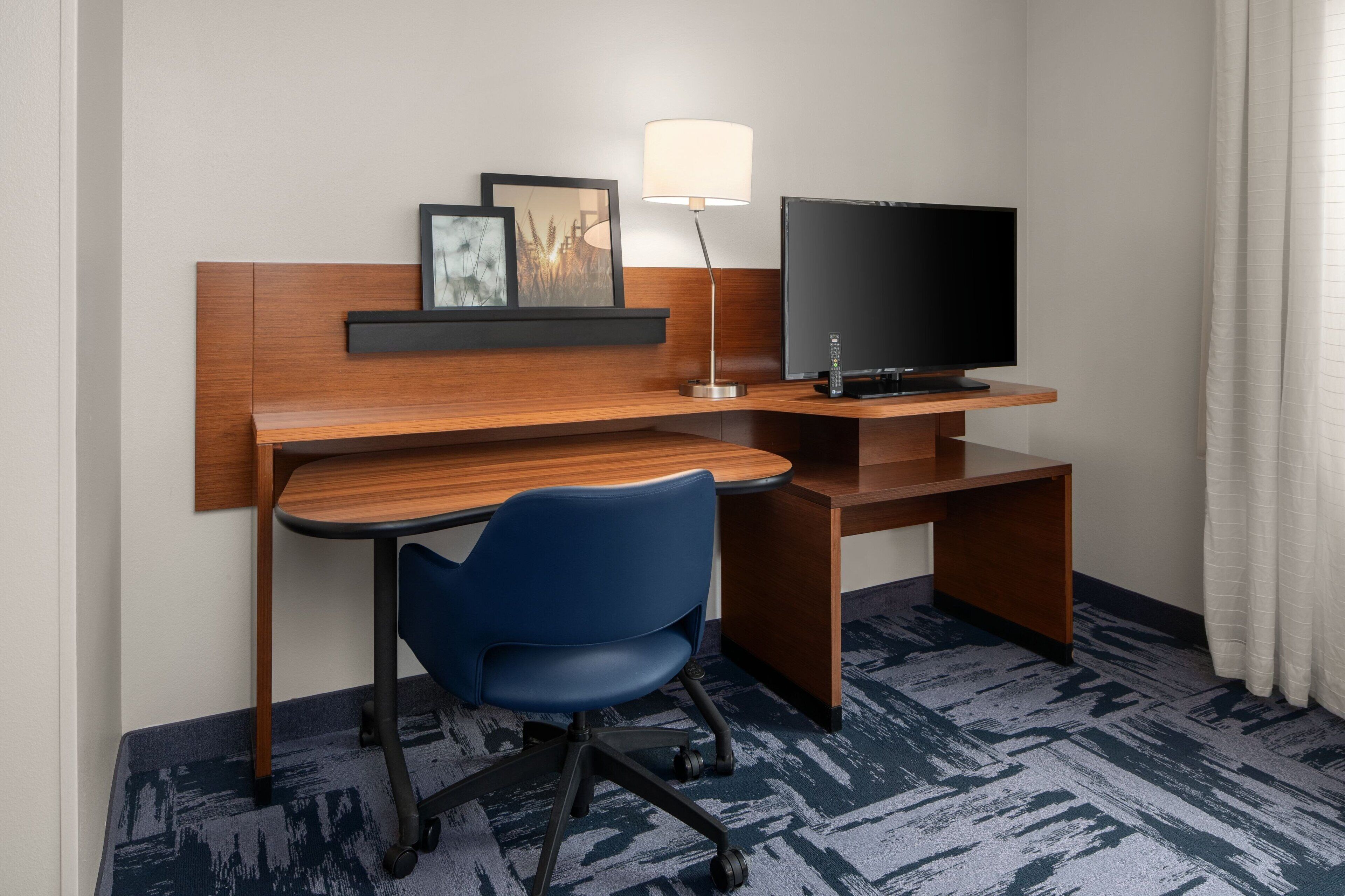 desk, laptop workspace, blackout curtains, iron/ironing board