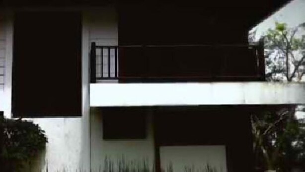 A modern two-story building with a flat roof and a balcony. - DM Residente Tagaytay (Lemery)