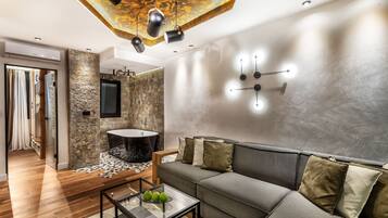 Luxury Apartment, 1 King Bed with Sofa bed | Living area | 50-inch Smart TV with digital channels, TV