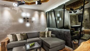 Luxury Apartment, 1 King Bed with Sofa bed | Living area | 50-inch Smart TV with digital channels, TV