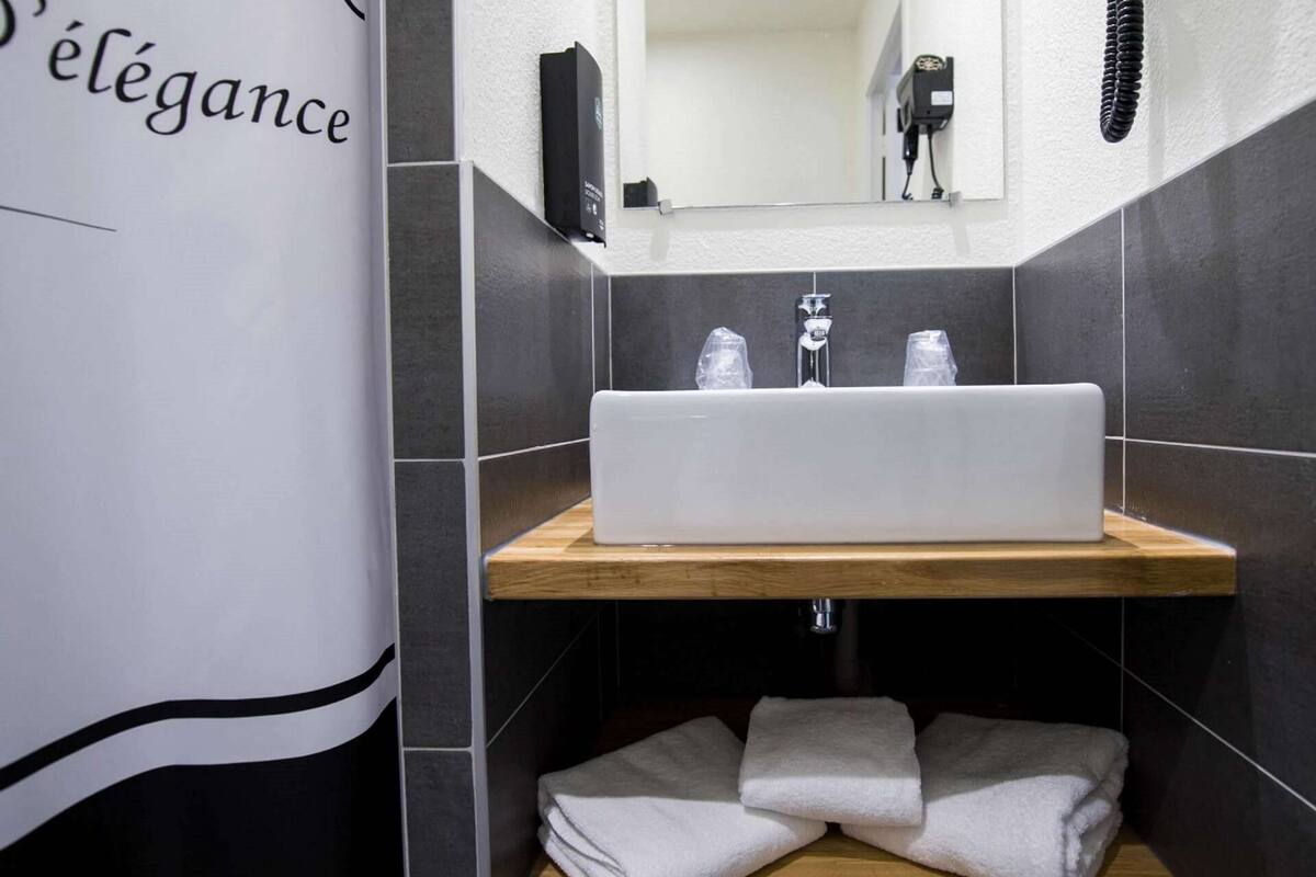 shower, eco-friendly toiletries, hair dryer, towels