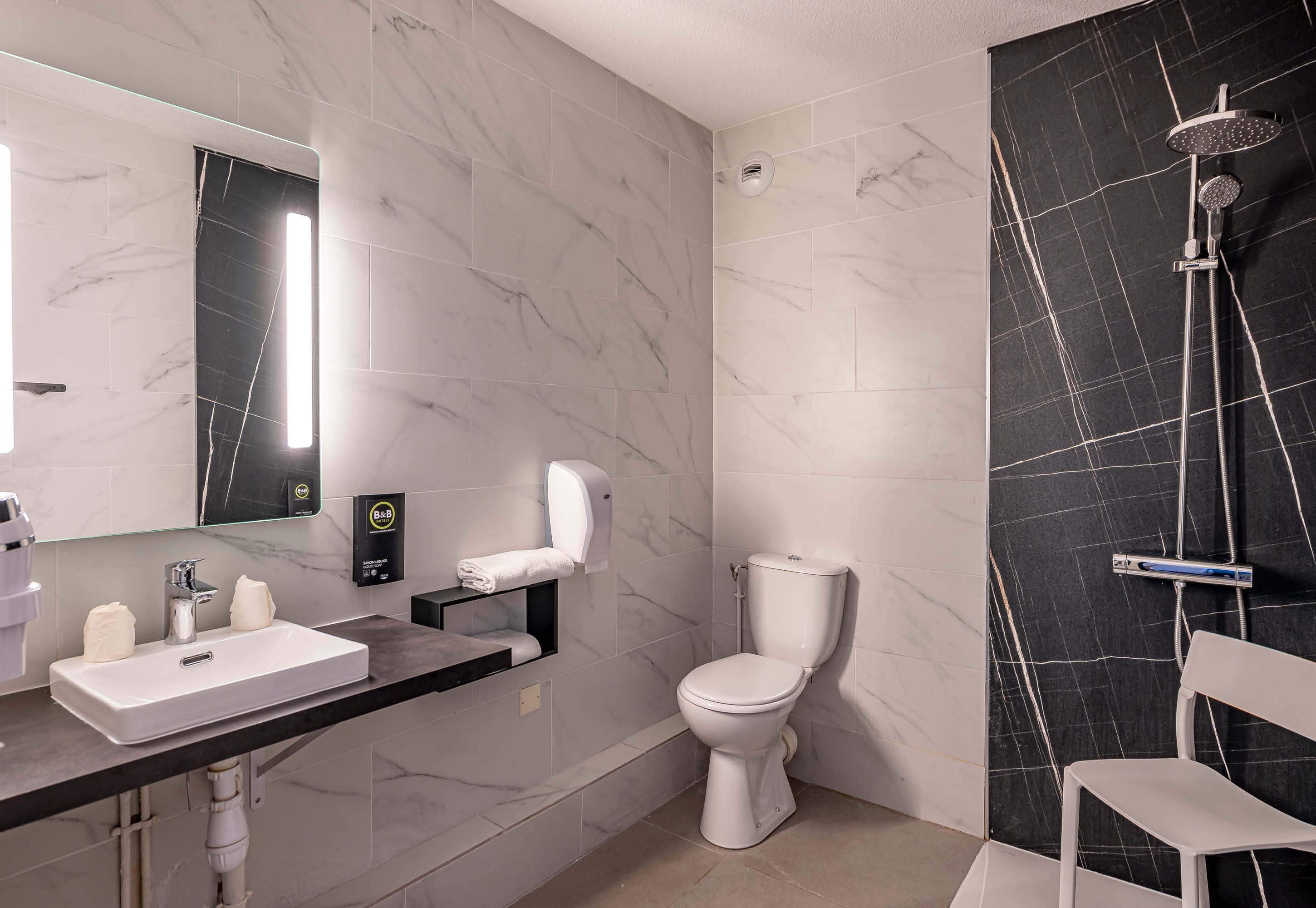 double room, accessible, non smoking | bathroom | shower, free toiletries, hair dryer, towels